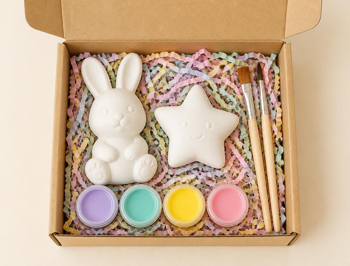 Little Dabbler Box — open ceramic subscription box with unpainted figurines, brushes and paint pots